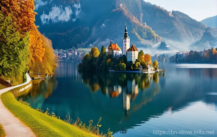 슬로베니아 물가 및 환전 팁 - **Prompt 1: Serene Autumn Morning at Lake Bled**
    "A picturesque, wide-angle shot of Lake Bled in...